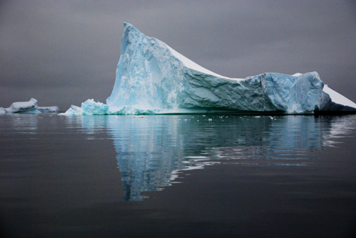 Iceberg Reflection in Dark Sea, Antarctica
