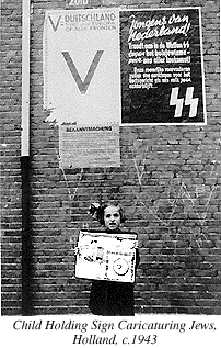 Dutch child Holding Sign Caricaturing Jews, c.1943